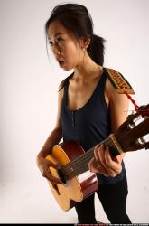 naomi-playing-guitar