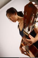 naomi-playing-guitar