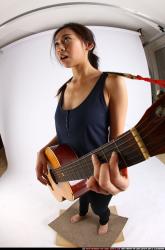 naomi-playing-guitar