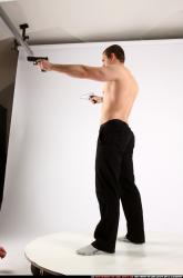 alex-dual-guns-pose2