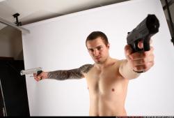 alex-dual-guns-pose2