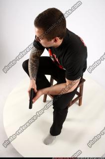 2013 09 ALEX SITTING PISTOL POSE1 07 A