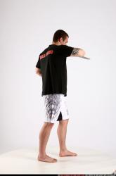 Man Adult Athletic White Fighting with knife Standing poses Sportswear