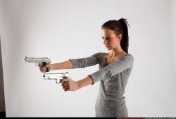 Peggy-double-guns-pose1