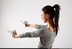 Peggy-double-guns-pose1