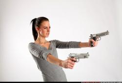 Peggy-double-guns-pose1