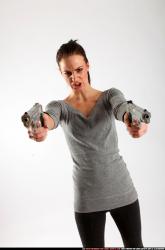 Peggy-double-guns-pose1