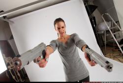 Peggy-double-guns-pose1