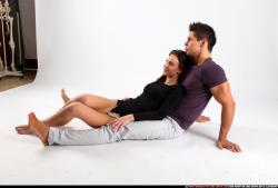 Man & Woman Adult Athletic White Daily activities Laying poses Casual