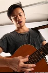 Jerald-playing-guitar