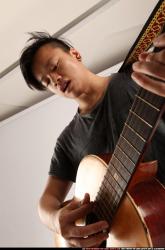 Jerald-playing-guitar