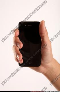2014 10 JERALD HOLDING SMARTPHONE CLOSE UP 00