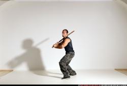 Man Adult Athletic White Fighting with sword Moving poses Casual