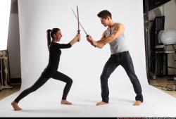 Man & Woman Adult Athletic White Fighting with sword Standing poses Casual