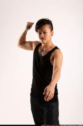 Man Young Athletic Fighting with knife Standing poses Casual Asian