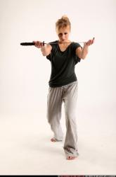 Woman Adult Athletic White Fighting with sword Standing poses Casual