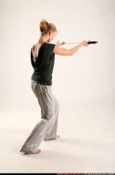 Woman Adult Athletic White Fighting with sword Standing poses Casual