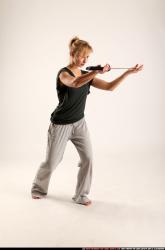 Woman Adult Athletic White Fighting with sword Standing poses Casual