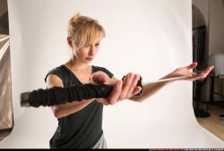 Woman Adult Athletic White Fighting with sword Standing poses Casual