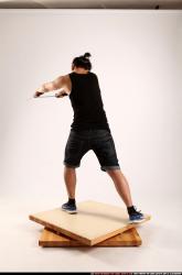 Man Young Athletic Fighting with sword Standing poses Casual Asian