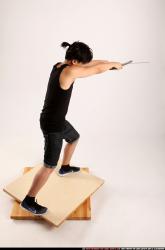 Man Young Athletic Fighting with sword Standing poses Casual Asian