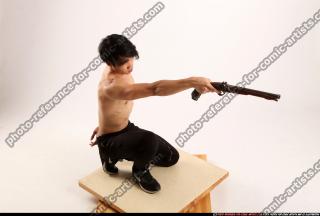 2015 02 KEIJI KNEELING AIMING FLINTLOCK 07 A