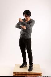 Man Young Athletic Fighting with knife Standing poses Casual Asian