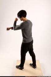 Man Young Athletic Fighting with knife Standing poses Casual Asian