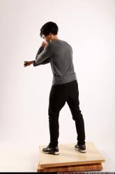 Man Young Athletic Fighting with knife Standing poses Casual Asian