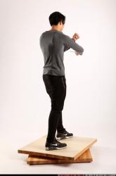 Man Young Athletic Fighting with knife Standing poses Casual Asian