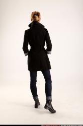 Woman Adult Athletic White Daily activities Moving poses Coat