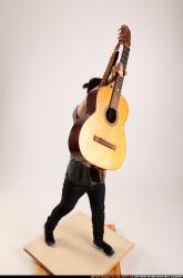 Jerald-lifting-guitar