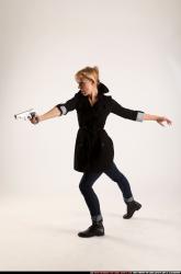 Woman Adult Athletic White Fighting with gun Standing poses Coat