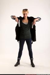 Woman Adult Athletic White Fighting with gun Standing poses Coat