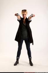 Woman Adult Athletic White Fighting with gun Standing poses Coat