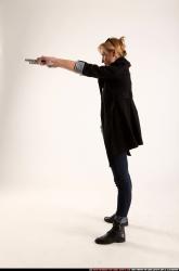 Woman Adult Athletic White Fighting with gun Standing poses Coat