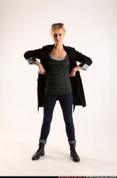 Woman Adult Athletic White Fighting with gun Standing poses Coat