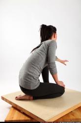 Woman Young Athletic White Daily activities Kneeling poses Casual