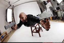 Man Adult Athletic White Fighting with gun Laying poses Casual