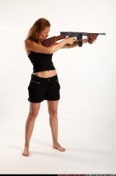 Woman Adult Athletic White Fighting with submachine gun Standing poses Casual