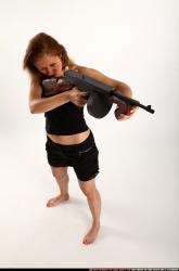 Woman Adult Athletic White Fighting with submachine gun Standing poses Casual