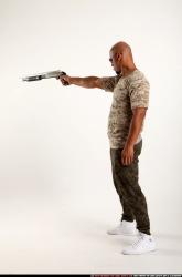 Man Adult Athletic Black Standing poses Army Fighting with shotgun