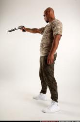 Man Adult Athletic Black Standing poses Army Fighting with shotgun