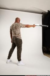 Man Adult Athletic Black Standing poses Army Fighting with shotgun