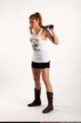 Woman Adult Athletic White Standing poses Casual Fighting with bat