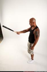 Man Adult Athletic Black Standing poses Sportswear Fighting with bat