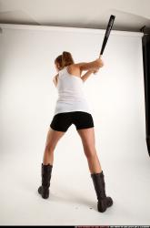 Woman Adult Athletic White Standing poses Casual Fighting with bat