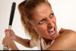 Woman Adult Athletic White Standing poses Casual Fighting with bat