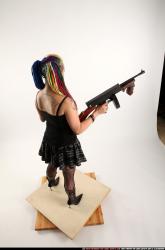 dolores-dual-tommyguns-pose1