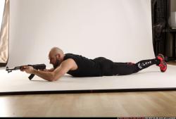 Man Adult Athletic White Fighting with submachine gun Laying poses Army